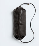 Clutch with elongated silhouette in Intrecciato leather, featuring an adjustable shoulder strap., , hi-res
