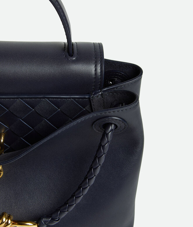 Top handle bag in silky calf leather with two-way flap and signature knot detail. Features a hidden hook closure, allowing the flap to be closed in the front or attached to the interior Intrecciato pocket., , hi-res