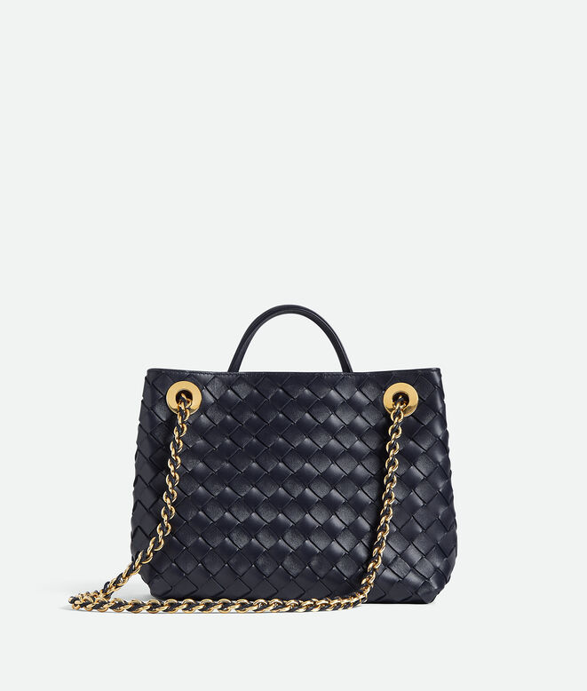 Top handle bag in Intrecciato leather with signature knot detail and tubular leather braided metal chain., , hi-res