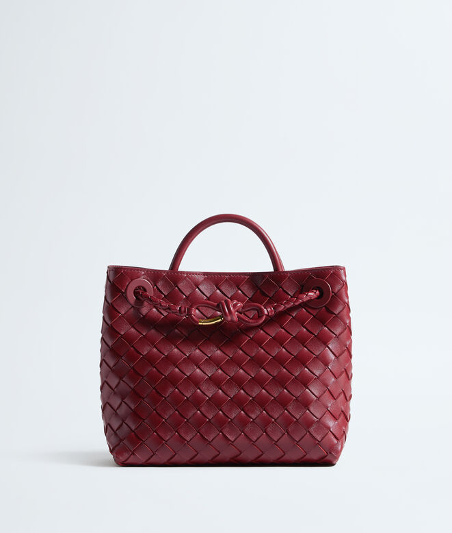 Top handle bag in supple Intrecciato leather, featuring a smooth leather covered signature knot detail and sliding cross-body strap., , hi-res