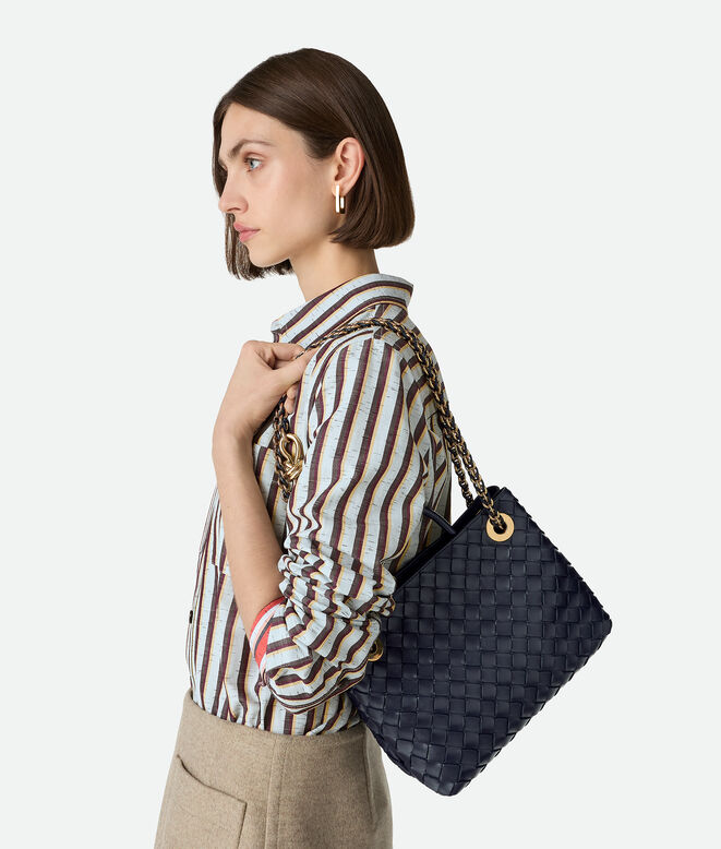 Top handle bag in Intrecciato leather with signature knot detail and tubular leather braided metal chain., , hi-res