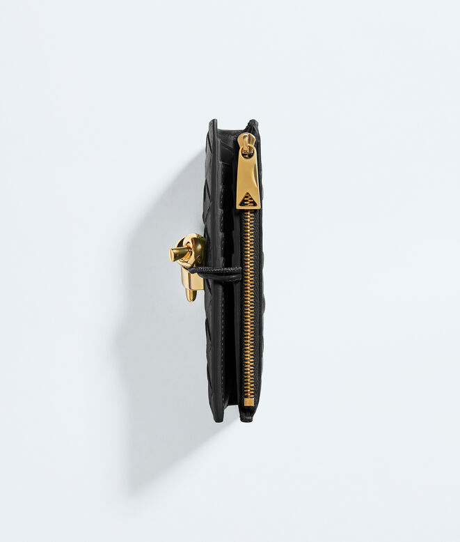 Medium bi-fold wallet in Intrecciato nappa leather, featuring a signature knot detail., , hi-res