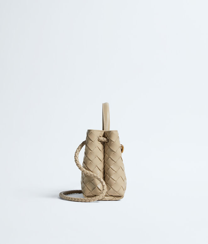 Top handle bag in supple Intrecciato leather with signature knot detail and sliding cross-body strap., , hi-res