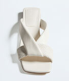 Flat mule sandal in smooth and micro Intrecciato leather with padded tubular straps and twisted design., , hi-res