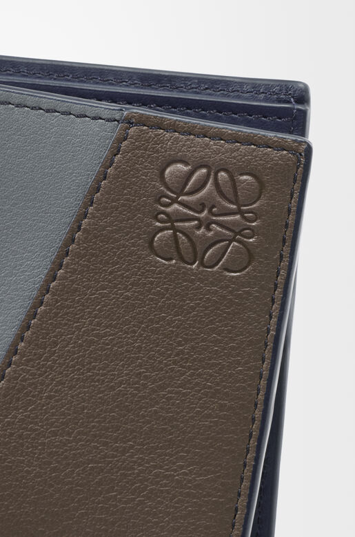 Puzzle bifold wallet in classic calfskin, , hi-res
