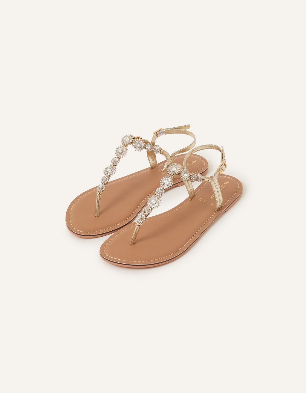 Accessorize embellished sandals top